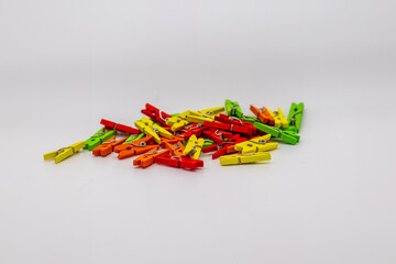 colourful pile of wooden pegs