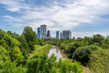 Fototapeta premium Houston, Texas, city skyline, Rosemont Bridge view, Buffalo Bayou, Urban green space. Public park.