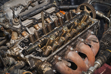 Close up of a car engine. Cylinder heads. Valves. Valve springs. Sixteen valves. Engine block....