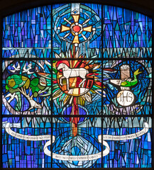 MILAN, ITALY - MARCH 6, 2024: The Lamb of God on the stained glass of the church Chiesa dei santi...