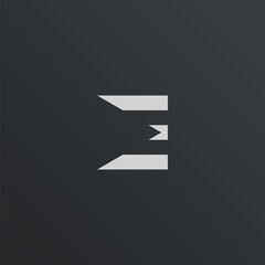 Logo design of E in monogram style, simple, luxury, minimalist. Minimal awesome E letter trendy for professional logo design template on gray background.