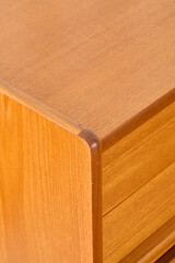 Vintage teak sideboard, Stylish Mid-century Modern small footprint credenza. Product photograph.