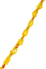 Natural Baltic Amber chain on white background