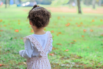 Little girl playing outdoors