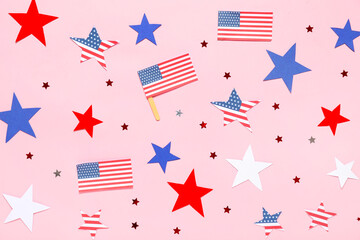 Composition with USA flags and stars on pink background. Independence Day celebration