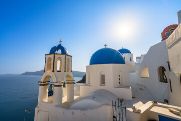 Blue domes of Oia village on Santorini island. Greece - obrazy, fototapety, plakaty