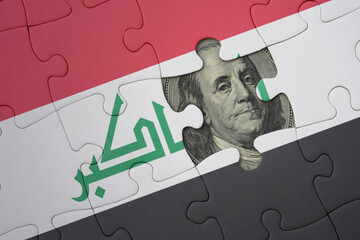 puzzle with the national flag of iraq and usa dollar banknote. finance concept