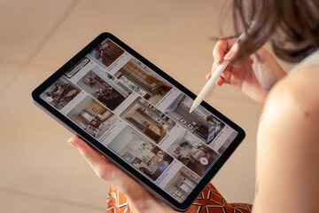 Architect using digital tablet in her work