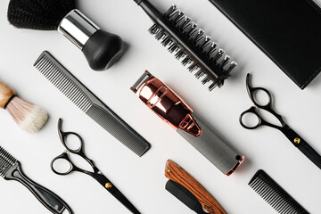 Pattern of various shaving and bauty care accessories for men on gray background