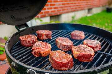 Beef steaks on the grill