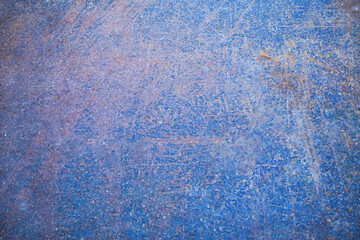 Rusty metal background. Colored steel texture.