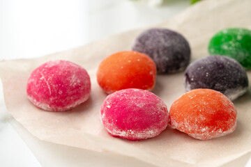 Multi-colored Japanese cakes Mochi in a white plate