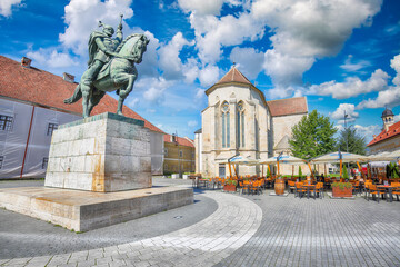 Statue of Michael the Brave and St Michael's Roman Catholic Cathedral in medieval fortress of Alba Iulia (Carolina).