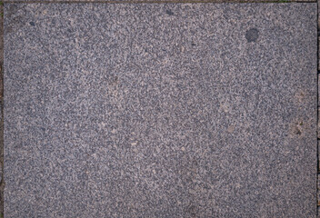 granite from a pedestrian street in Toruń - obrazy, fototapety, plakaty