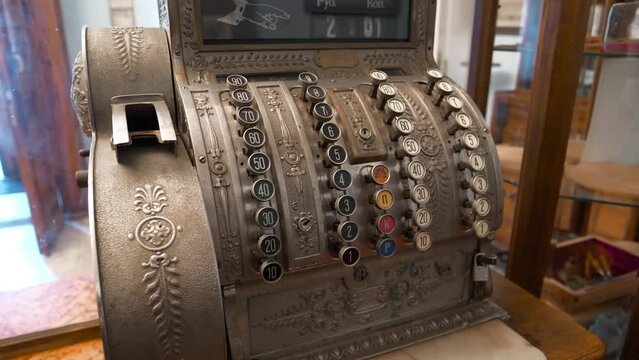 Antique cash register. Old mechanical cash register in an old pharmacy
