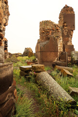 Rocks, bricks and pillars are lying around inside the ruins of King Gagik`s Church of St., Saint...