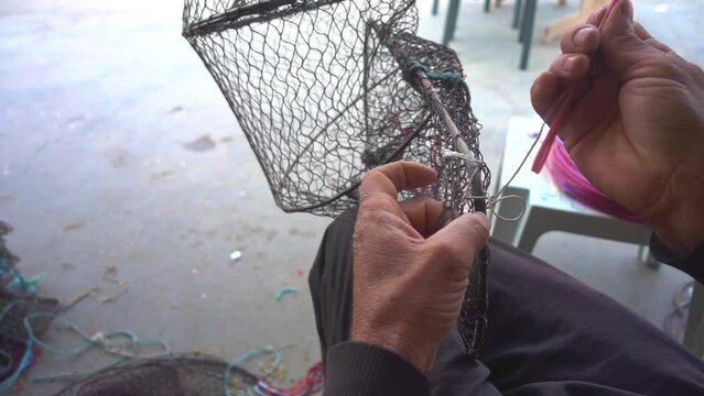 Fisherman Repairs Fish Catching Basket Creel Net Tackle Footage.
