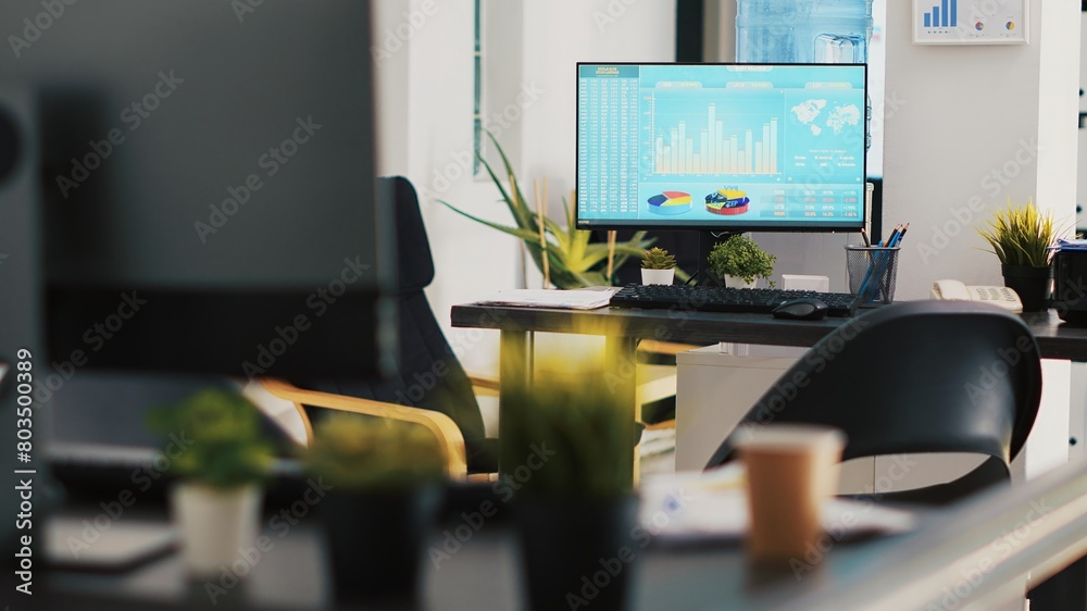 Poster computer screen in business office shows stock exchange values changing in real time. desktop pc mon