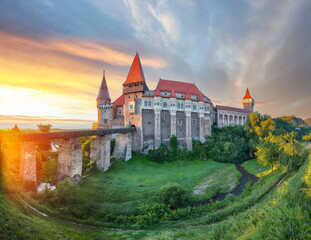 Amazing panoramic morning view of Hunyad Castle / Corvin's Castle with wooden bridge.