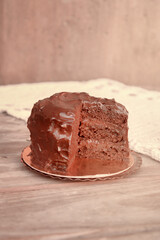 Little Chocolate Cake with Chocolate Ganache on a Plate. Tea Time