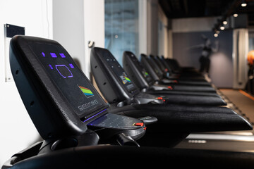 Perspective view of the treadmills in the gym