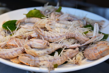 fresh mantis shrimp with lemon on wood board praying mantis crayfish