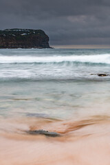 Rainy day sunrise at the beach