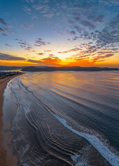 Sunrise seascape with pretty clouds in the sky