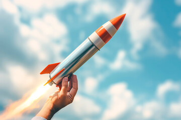 Businessman control rocket is launching and soar flying out from hand to sky for growth business, Fast business success, Start-up business concept
