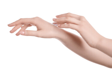 Woman applying cream on her hand against white background, closeup