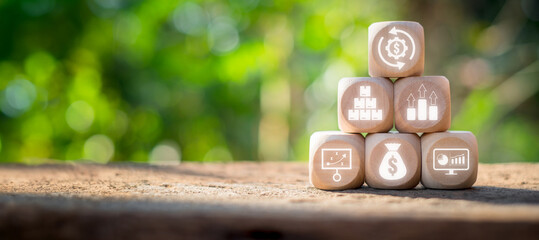 Market economy concept, Wooden block on desk with market economy icon on virtual screen.