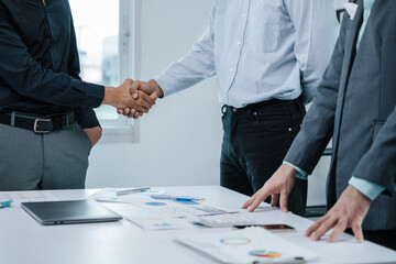 Teamwork business group are meeting working and shakehands after success dealing business agreement