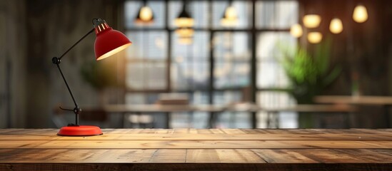 Red lamp placed on top of a rustic wooden table within a cozy restaurant ambiance