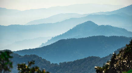 Morning fog over the mountain in Vietnam. Sunrise with fog in early morning. Layers of mountain.