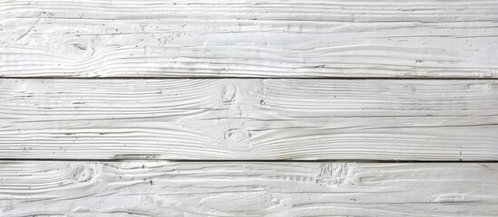 Obraz premium A detailed view of a white painted wood wall complemented by a wooden floor, showcasing a clean and minimalist design