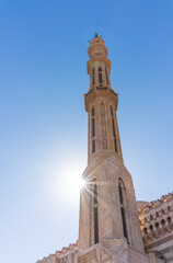 Fototapeta premium Tower of Al Mustafa Mosque in Old Town of Sharm El Sheikh in Egypt, at sunset