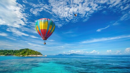 Hot air balloon floating over island with copy space area.