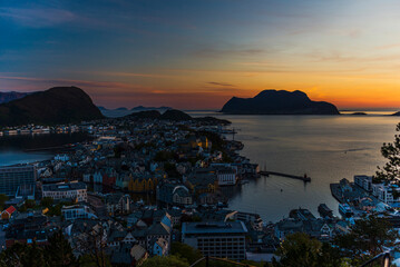 Fototapeta premium top view of a sunset over Alesund during a sunny spring evening, Norway