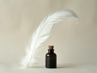 A feather and a bottle of ink sit on a table
