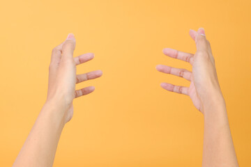 Close up of two female hands reaching and holding for first person point of view