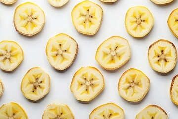 Closeup shot of banana slices symmetrically arranged on a white backdrop, showcasing the fruits intricate details, suitable for culinary websites or food blogs