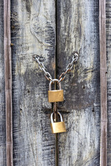 wooden texture door and padlocks