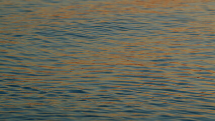 Orange Sea At Sunset. Ocean Beach Waves On Beach At Sunset Time. Sunset Ocean Background. Slow motion.