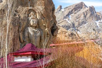 Carved stone Buddha at the Mulbekh Buddhist Gompa in northern India