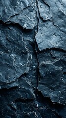 Textured Blue Slate Rock Surface with Water Droplets - A Detailed Natural Background