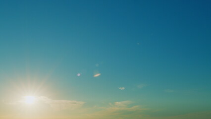 Blue Sky Background With Tiny Clouds. Low Angle View. Blue Clear Sky And White Clouds.