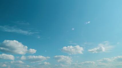 Flying Moving White Clouds In A Blue Sky. Blue Sky Background With Many Layers Tiny Clouds.