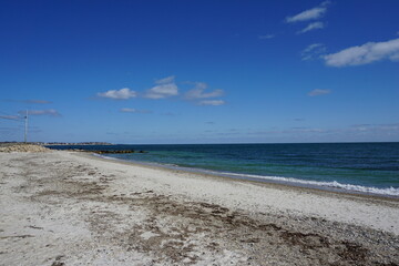 blue sky and sandy beach view along the new england coast of marthas vineyard in winter - Powered by Adobe