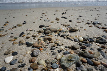 beach rocks along the new england coast of marthas vineyard in winter