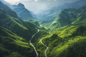 Aerial view of a winding mountain road in the Andes mountains, a top down perspective of a valley with a river and village at the bottom. A stunning aerial photo shot 